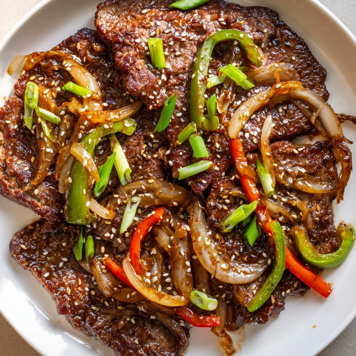 Savory Asian-inspired cube steak seared golden and draped in a thick, caramelized oyster sauce