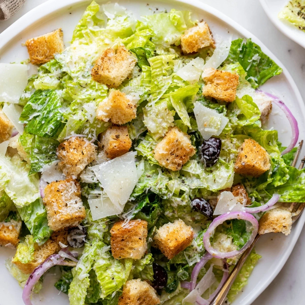 Crisp Olive Garden Salad topped with croutons, pepperoncini, and tangy Parmesan dressing
